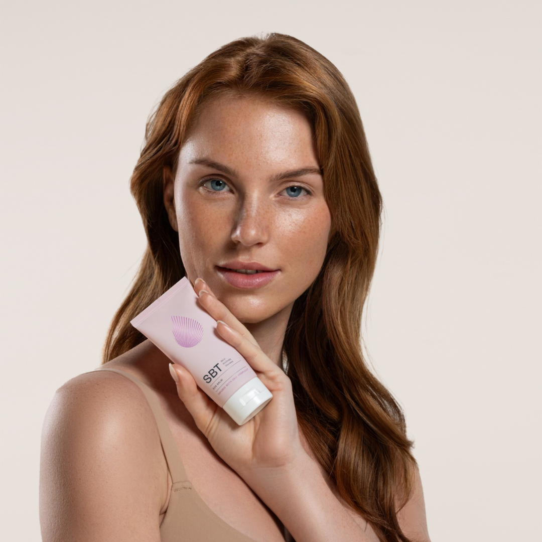 SBT SOS Balm with model posing