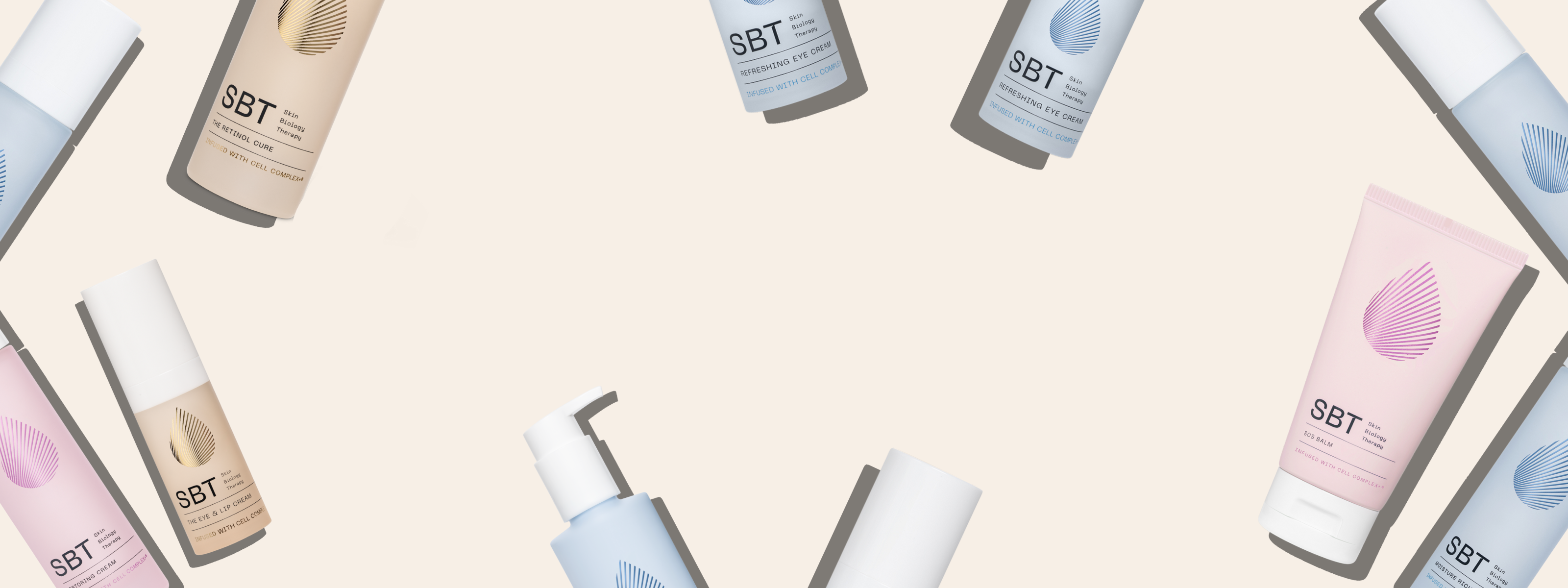 Various skincare products with 'SBT' branding on a light beige background