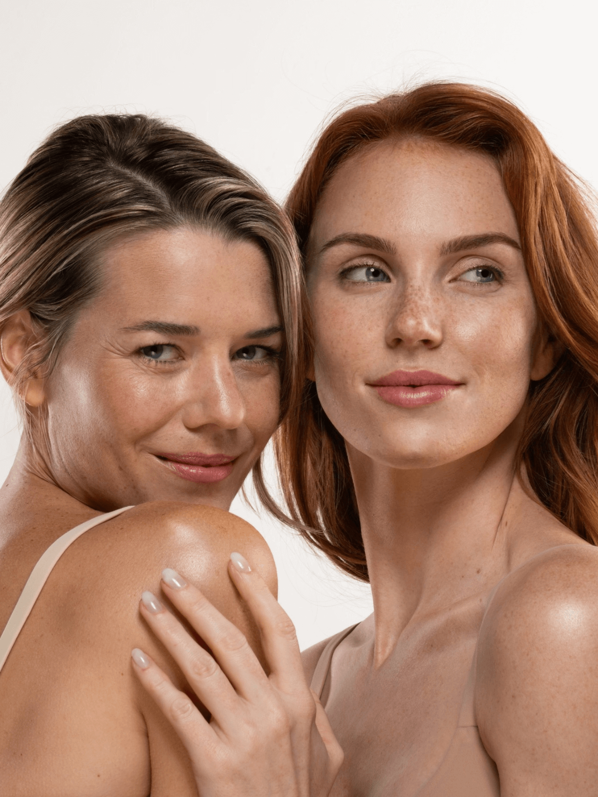 Two models posing with white background